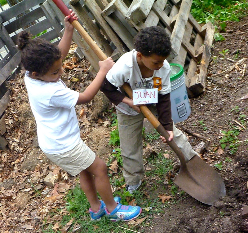 Kids gardening together